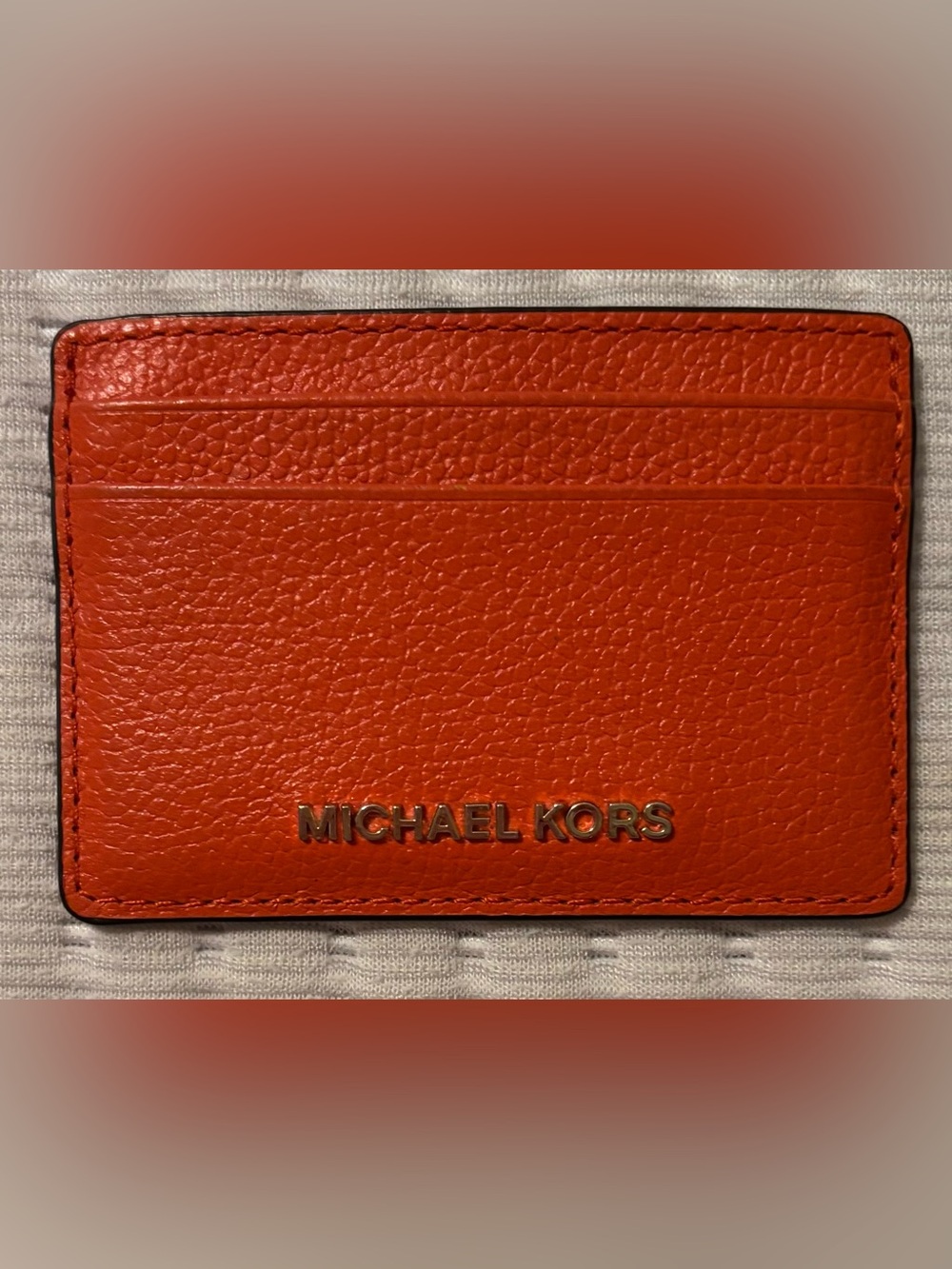 Michael Kors orange pebbled leather cardholder - Like New